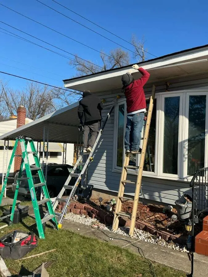 Restoration crew performing exterior repair in Happy Valley